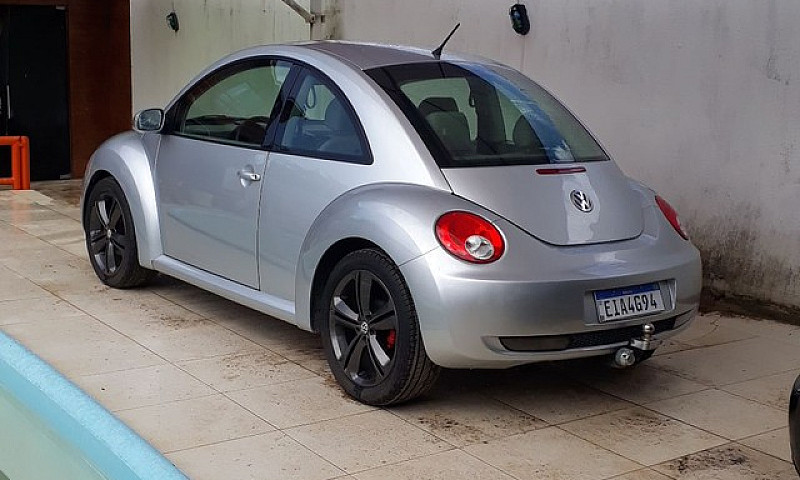 Automóvel New Beetle...
