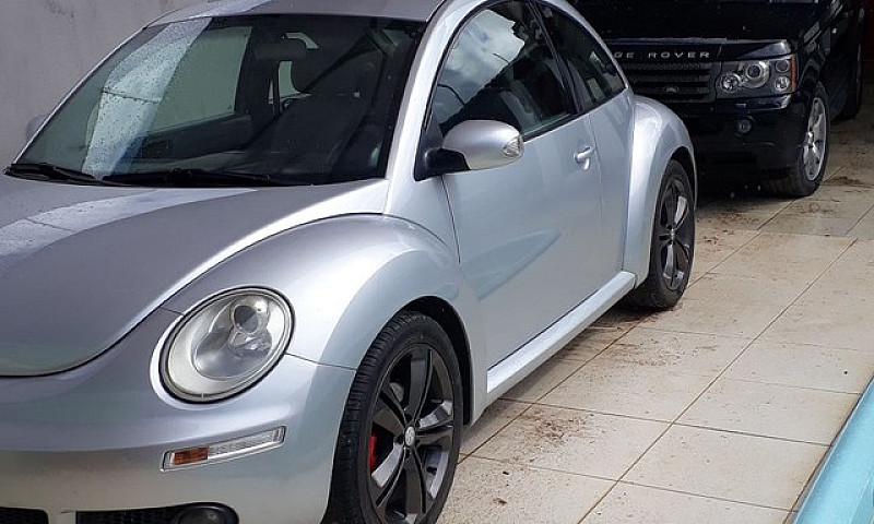Automóvel New Beetle...
