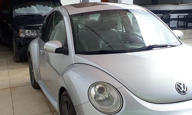 Automóvel New Beetle...