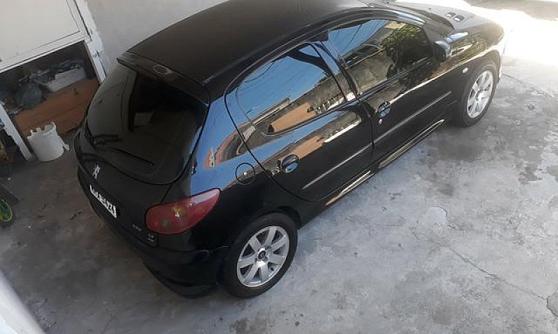 Peugeot 206 14.900...