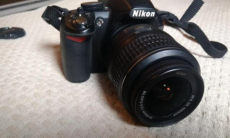 Nikon D3100 + Lente ...