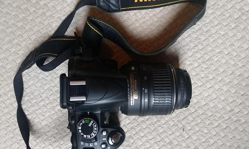 Nikon D3100 + Lente ...
