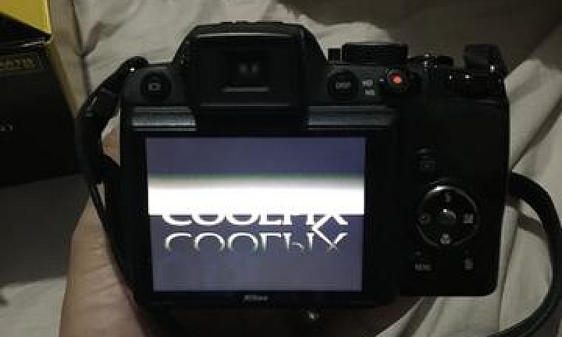 Câmera Fotográfica...
