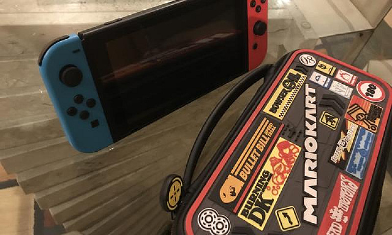 Nintendo Switch + Ca...