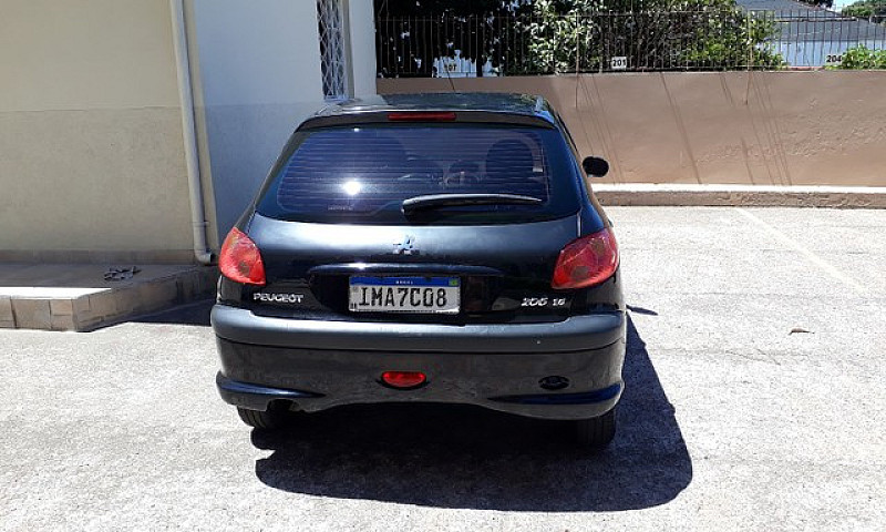 Barbada. Peugeot 206...