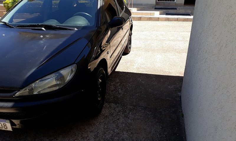 Barbada. Peugeot 206...