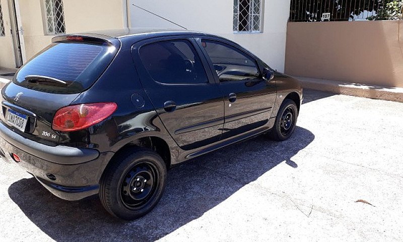 Barbada. Peugeot 206...