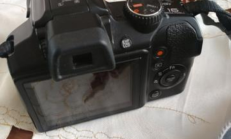 Câmera Fotográfica...