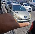 Peugeot 207 Sedan Passion Xr 1.4 Flex 8V 4P 2013