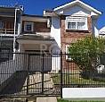 Excelente Casa Com 03 Dormitórios, Sendo Um Deles Suíte No Bairro Guarujá, Com Living Esta