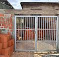 Casa Meio Terreno 